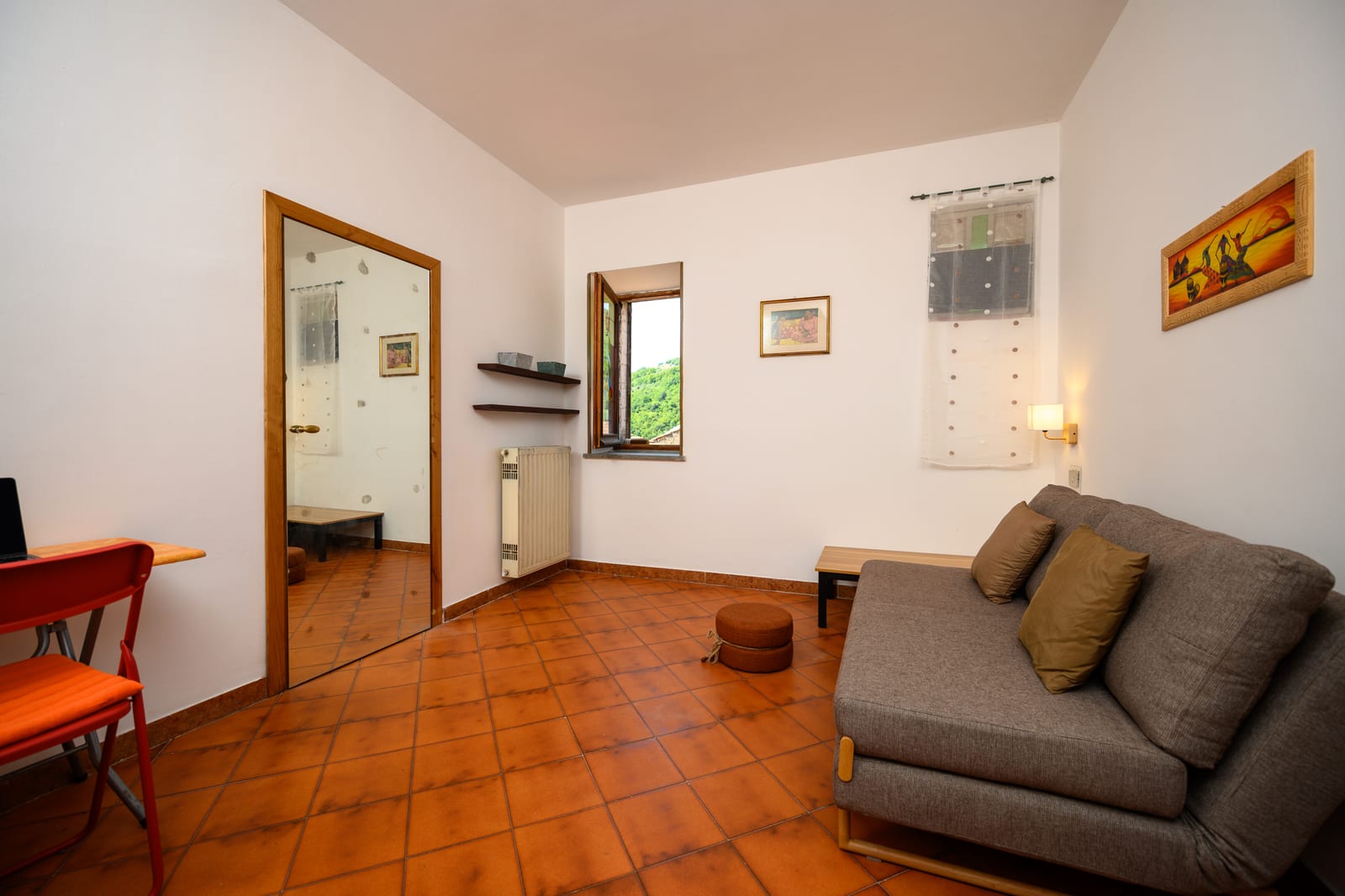Soggiorno con divano letto, Casa delle Colline